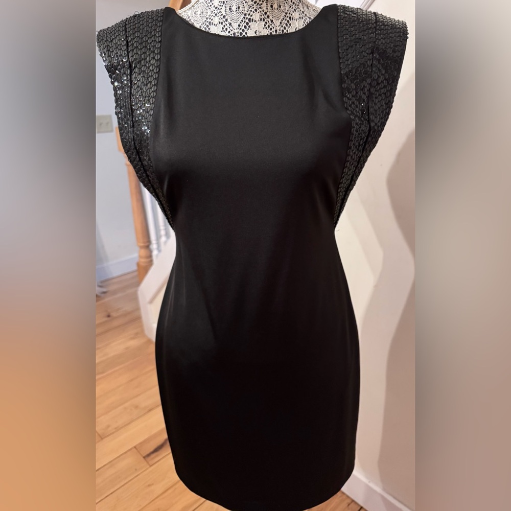 CACHE BLACK DRESS. Embellishment on shoulders and low back.